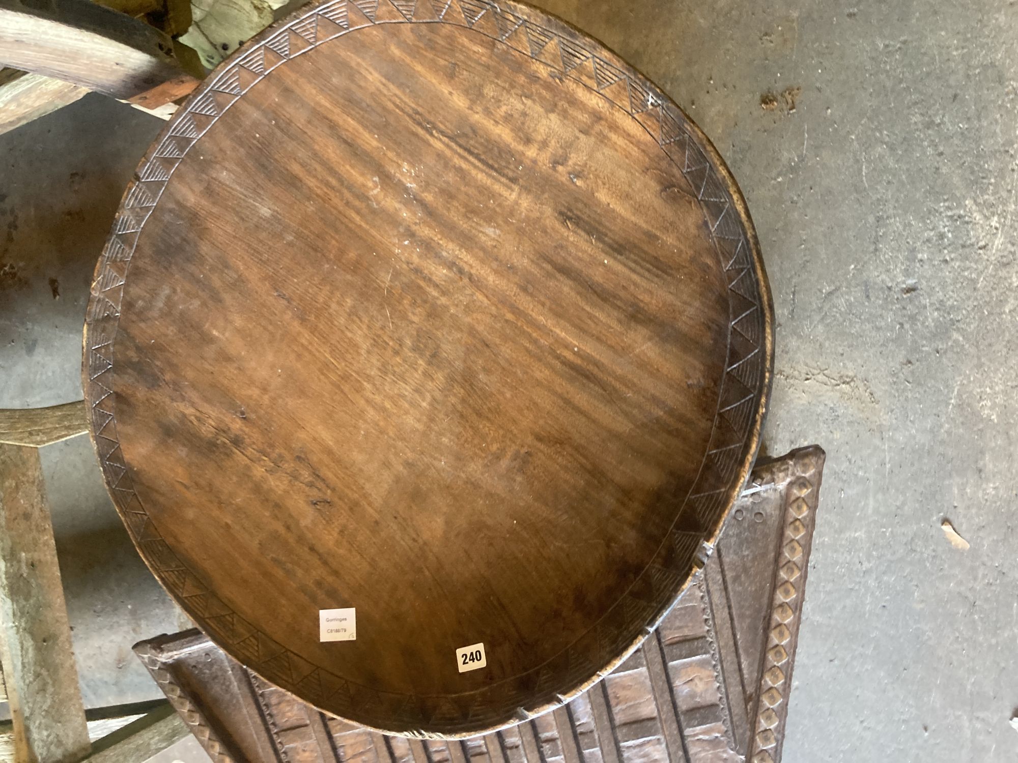 Two African carved hardwood tables, largest 72cm diameter 50cm high